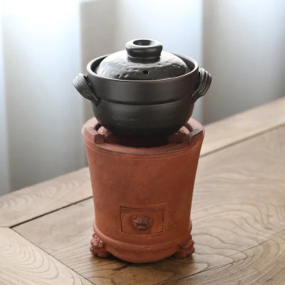 this is a pottery cooking pot