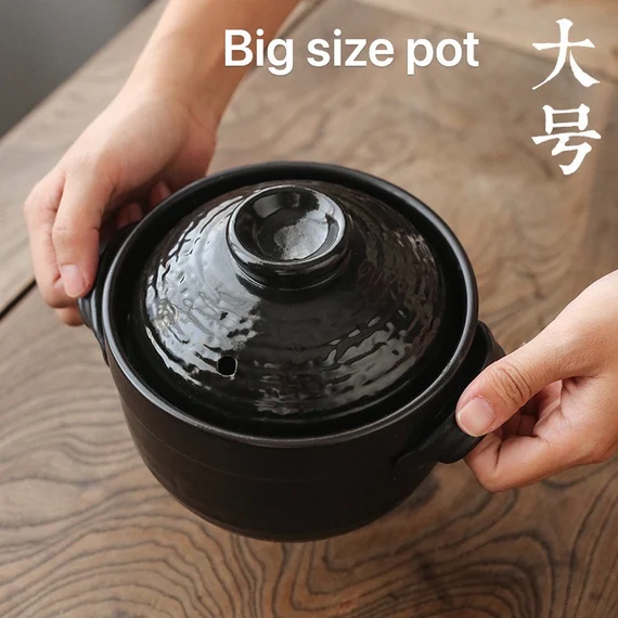 this is a pottery cooking pot