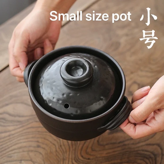 this is a pottery cooking pot