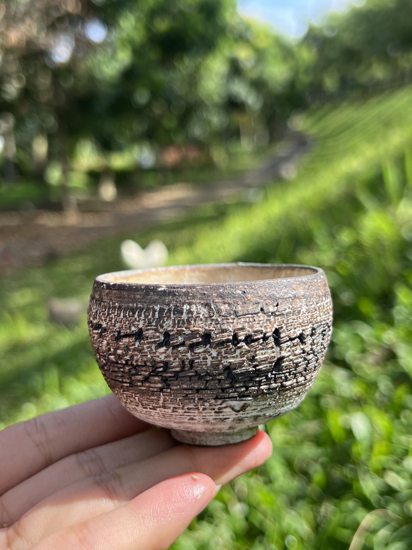 This is a pottery teacup