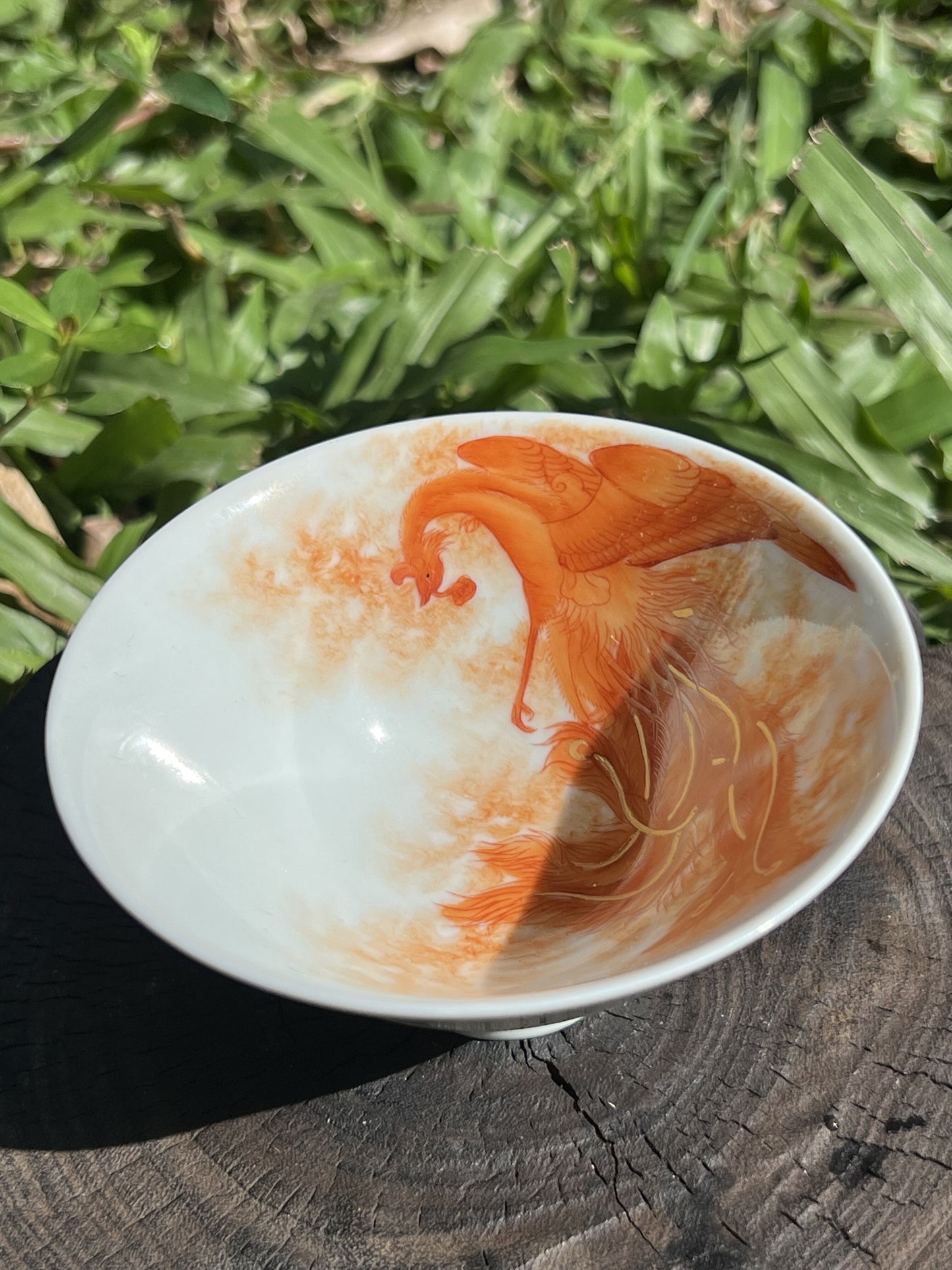 this is a Chinese Jingdezhen alum red phoenix teacup.this is a ceramic teacup