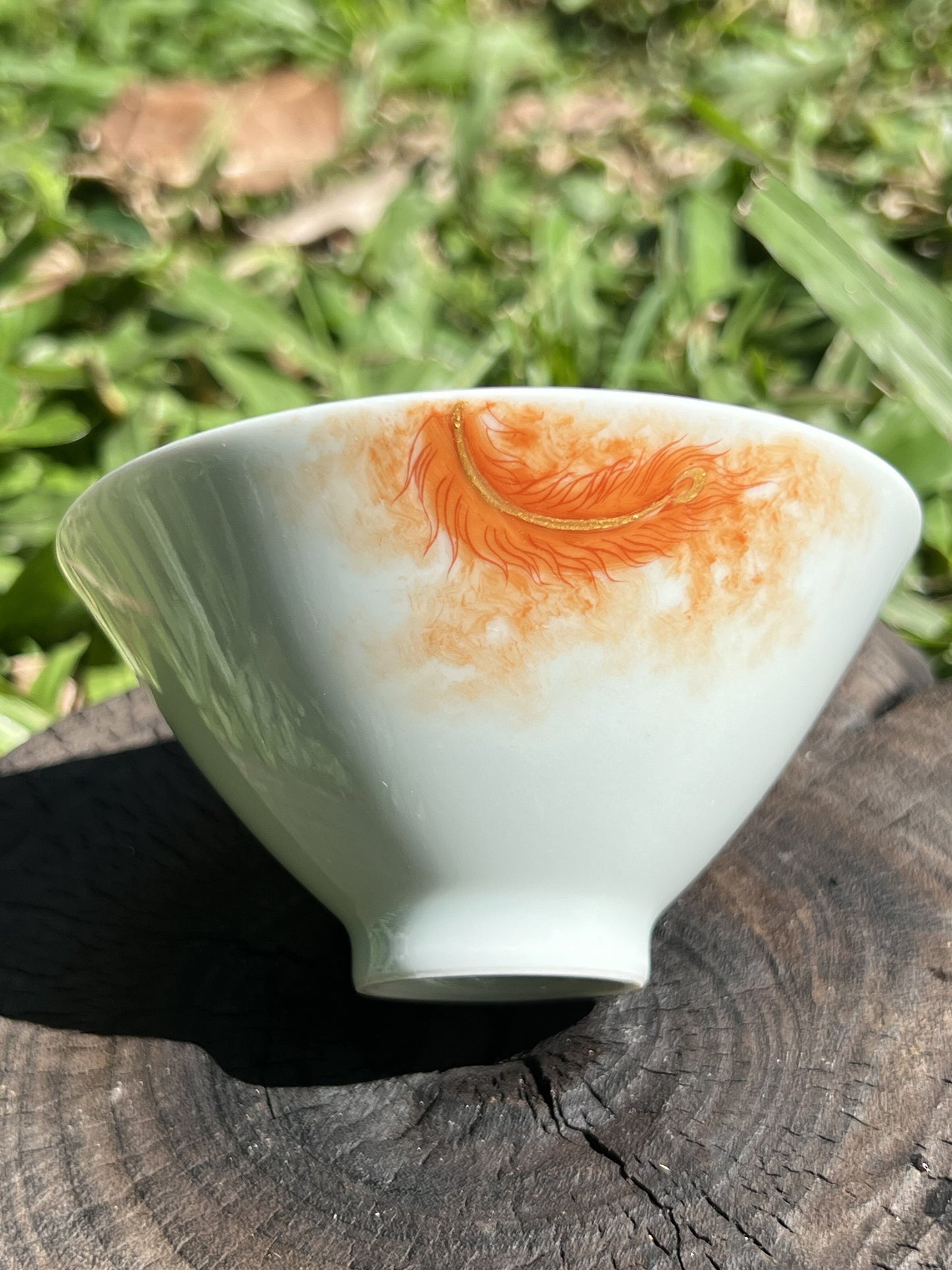 this is a Chinese Jingdezhen alum red phoenix teacup.this is a ceramic teacup