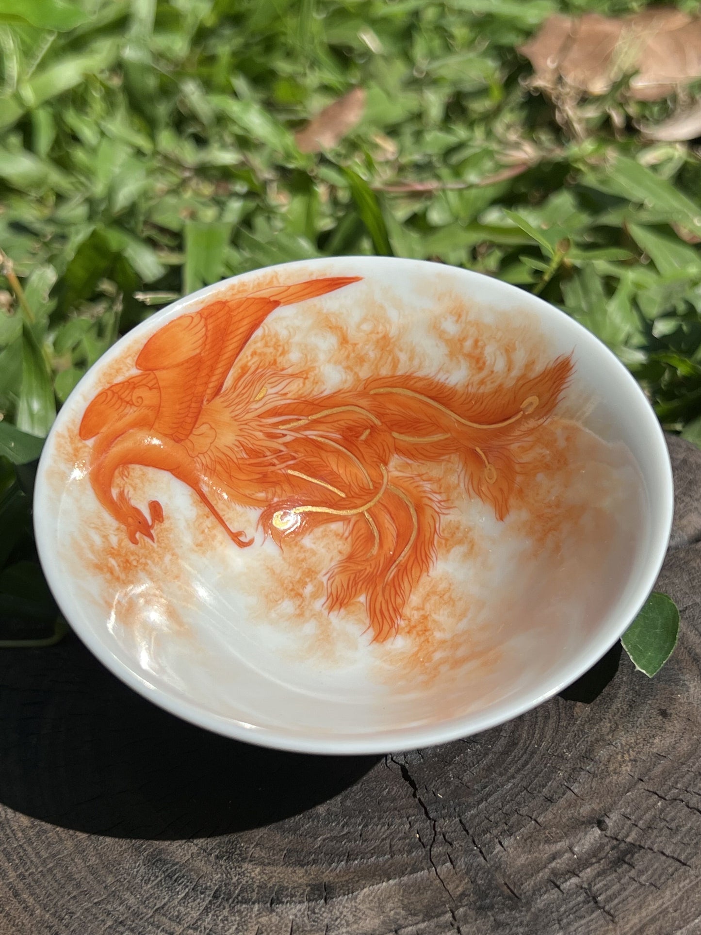 this is a Chinese Jingdezhen alum red phoenix teacup.this is a ceramic teacup