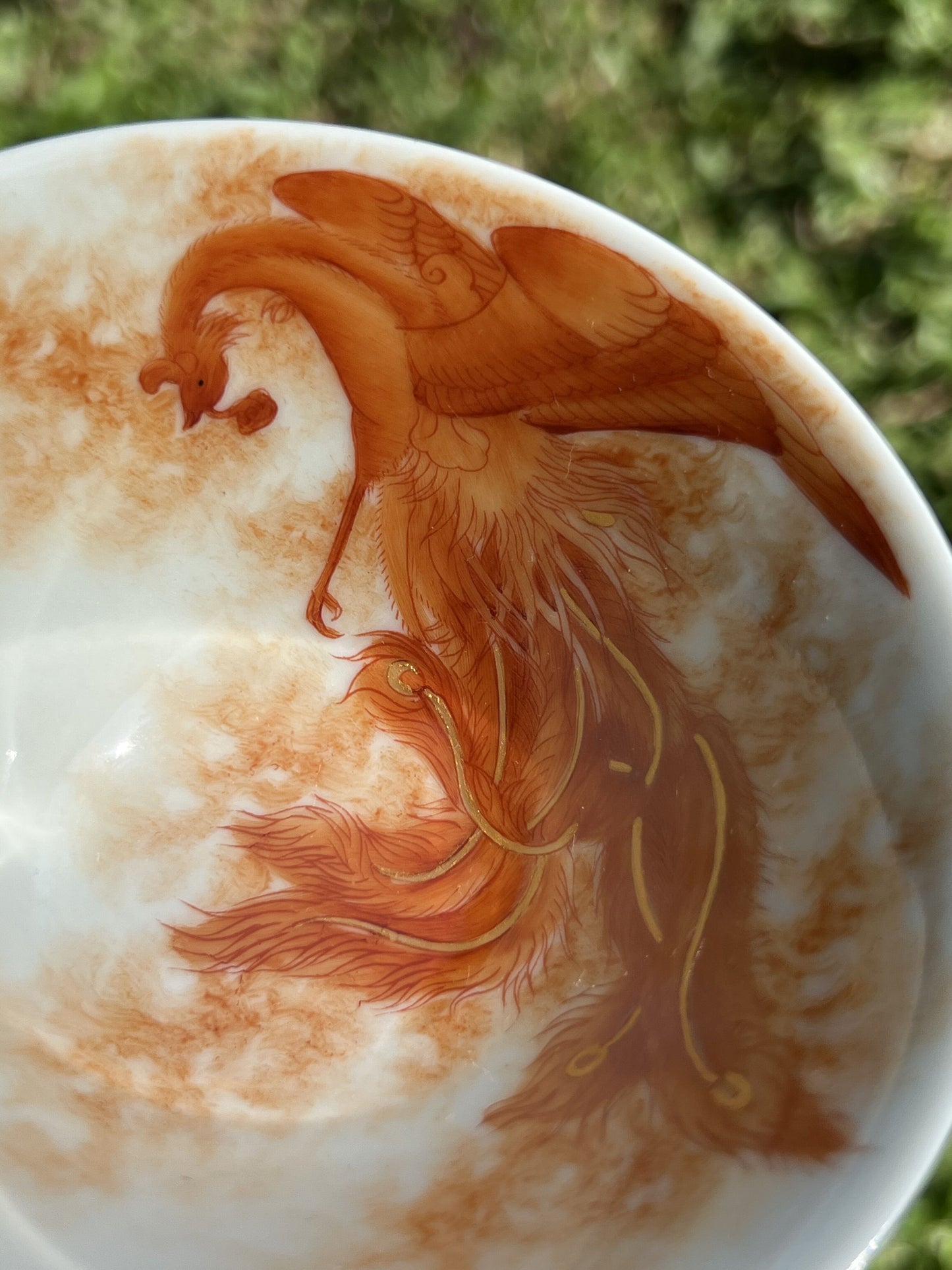 this is a Chinese Jingdezhen alum red phoenix teacup.this is a ceramic teacup