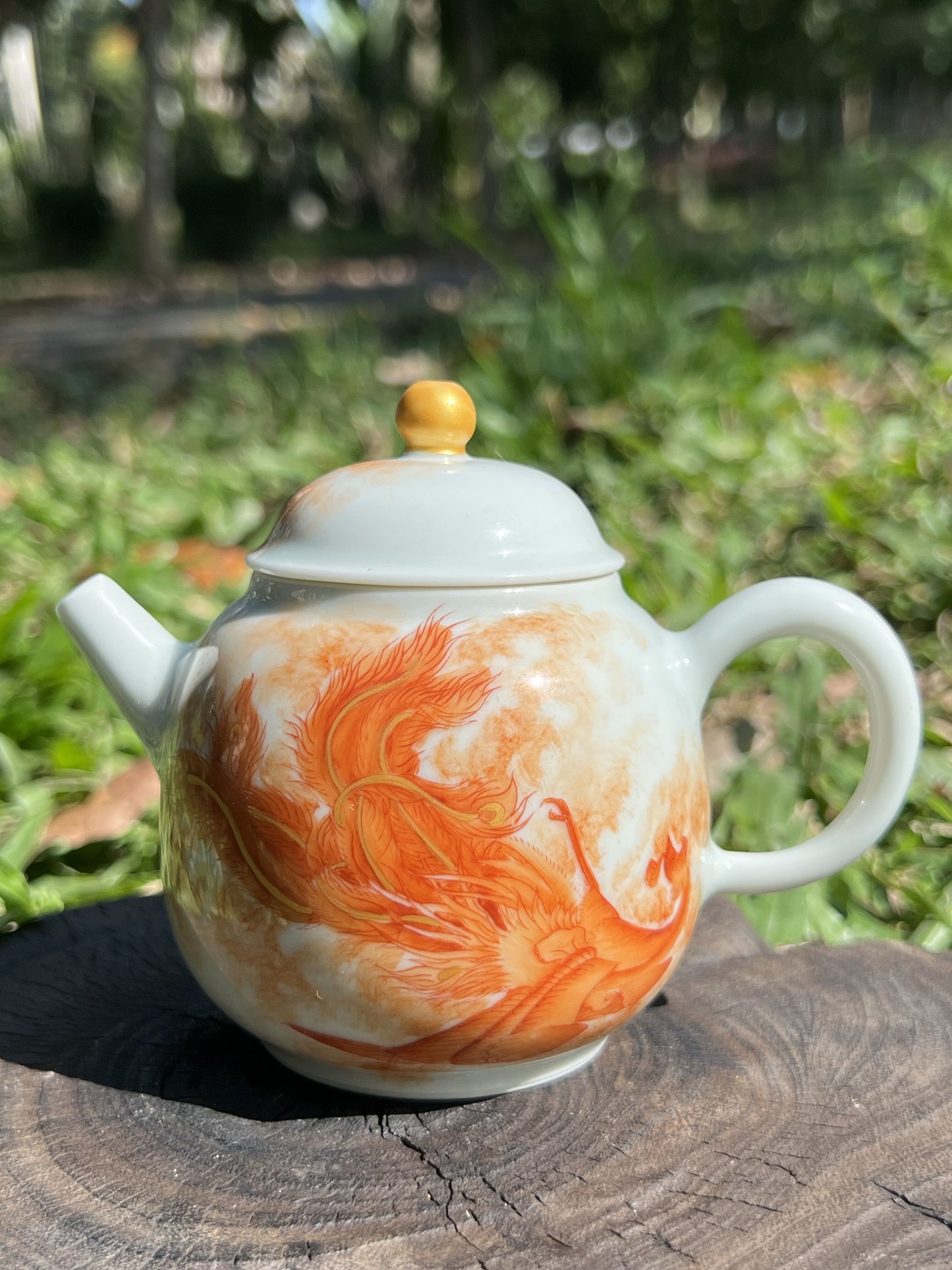 this is a Chinese Jingdezhen alum red phoenix teapot.this is a ceramic teapot