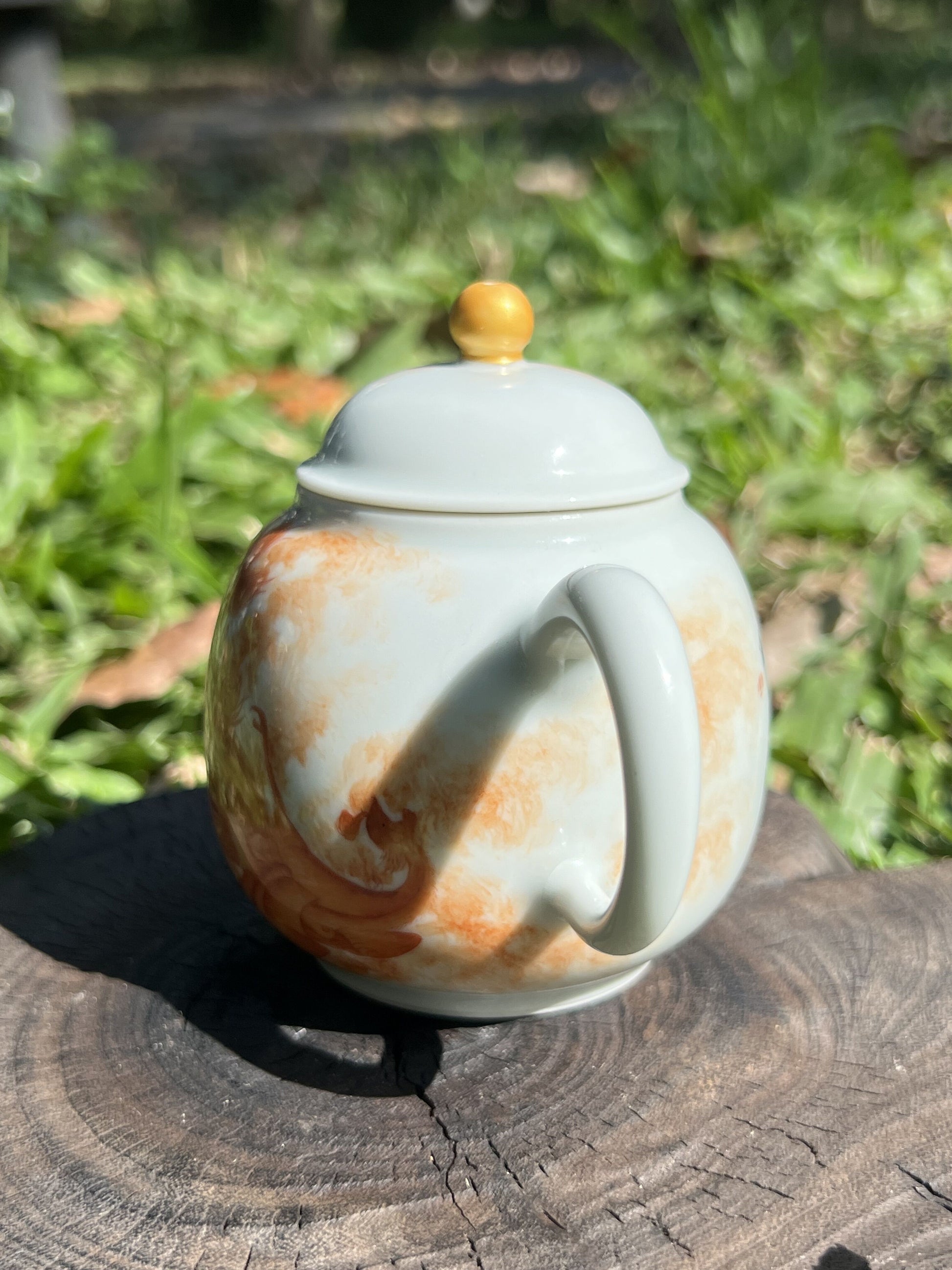 this is a Chinese Jingdezhen alum red phoenix teapot.this is a ceramic teapot