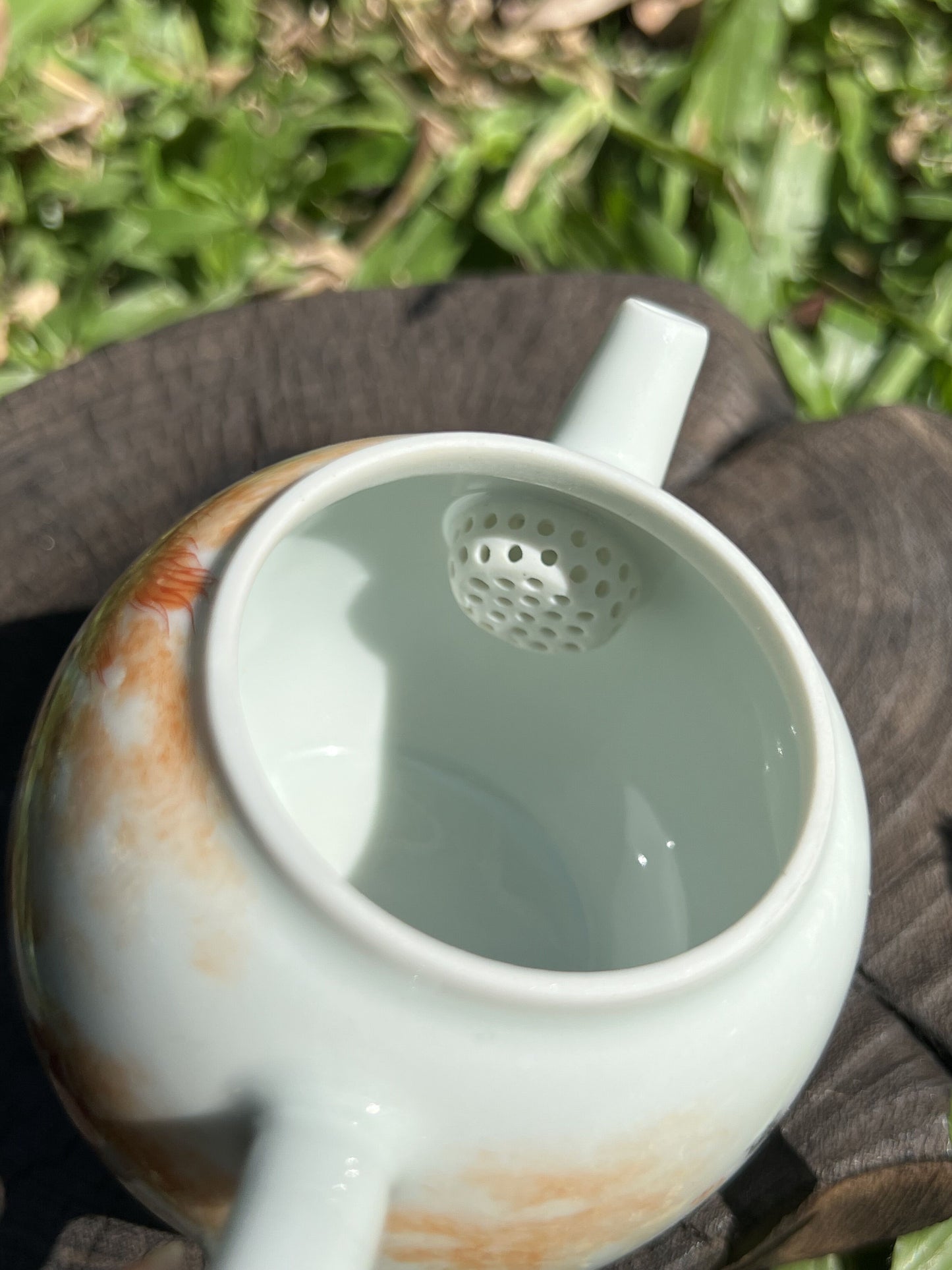 this is a Chinese Jingdezhen alum red phoenix teapot.this is a ceramic teapot