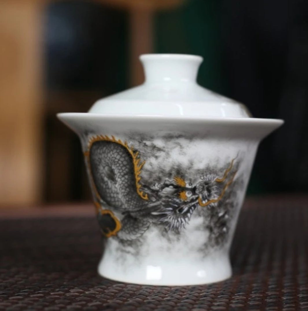 this is a Chinese Jingdezhen ceramic dragon teapot gaiwan