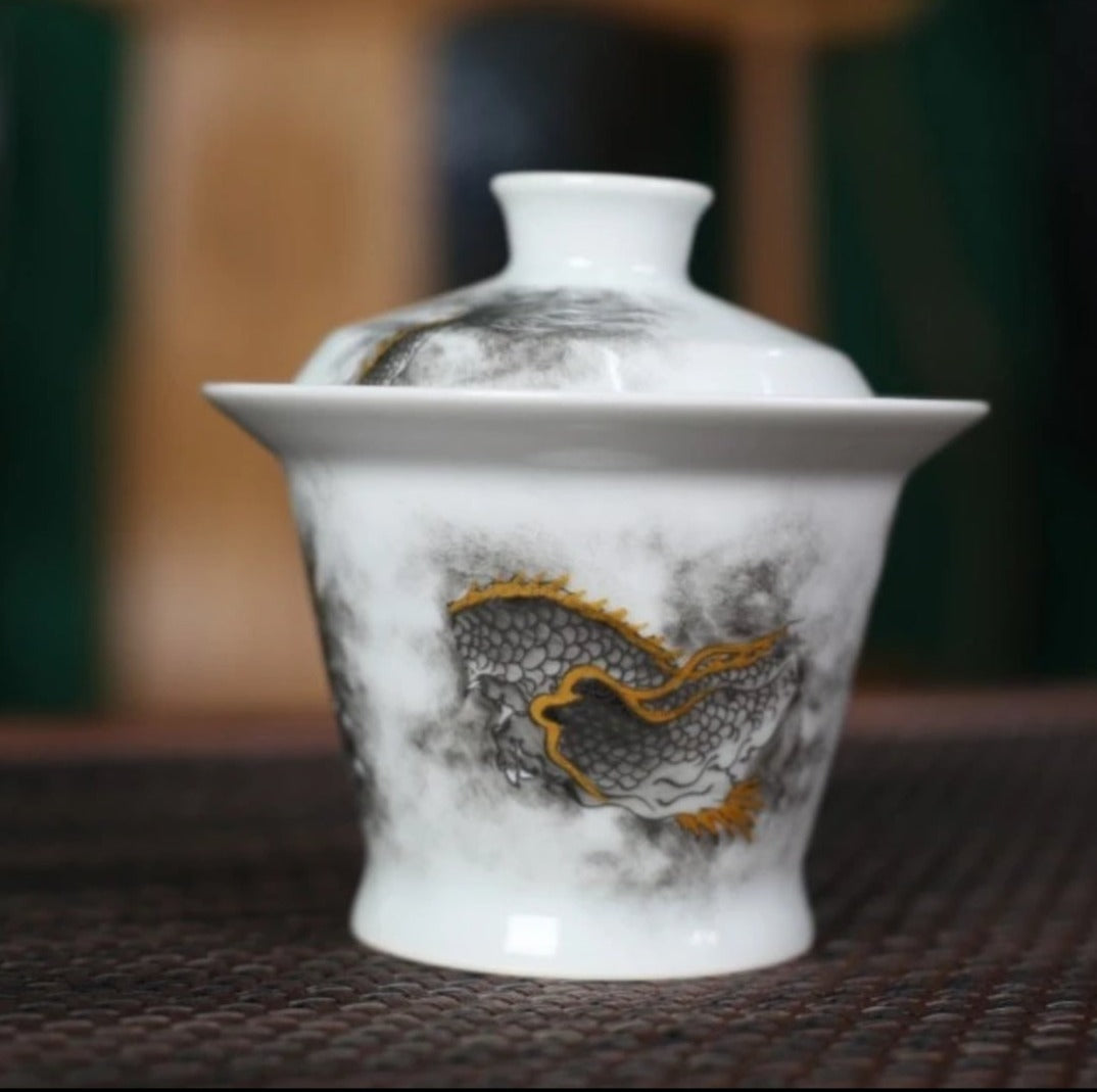 this is a Chinese Jingdezhen ceramic dragon teapot gaiwan