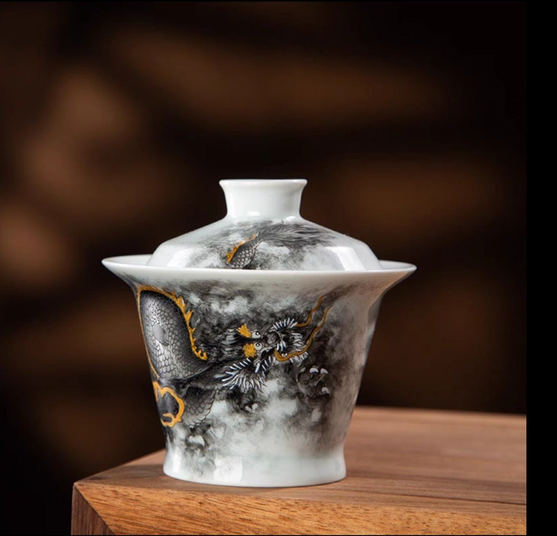 this is a Chinese Jingdezhen ceramic dragon teapot gaiwan