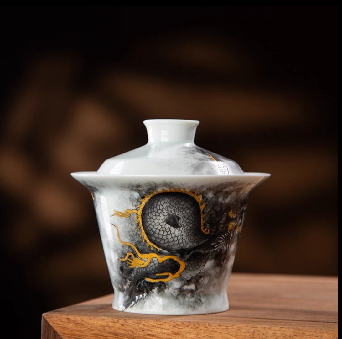 this is a Chinese Jingdezhen ceramic dragon teapot gaiwan