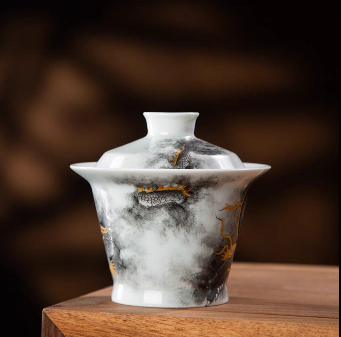 this is a Chinese Jingdezhen ceramic dragon teapot gaiwan