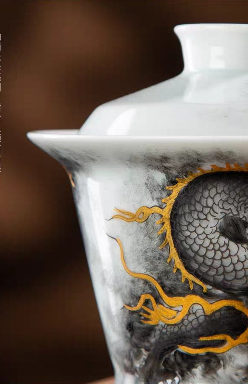 this is a Chinese Jingdezhen ceramic dragon teapot gaiwan