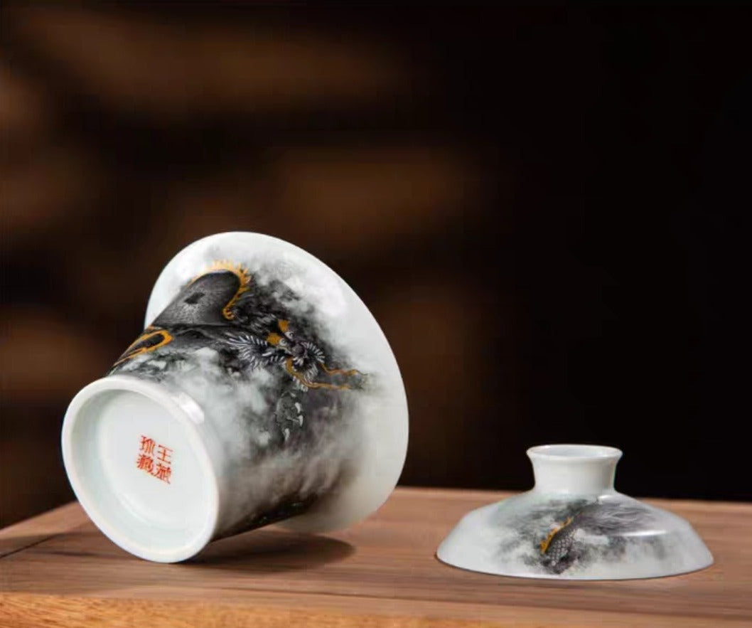 this is a Chinese Jingdezhen ceramic dragon teapot gaiwan