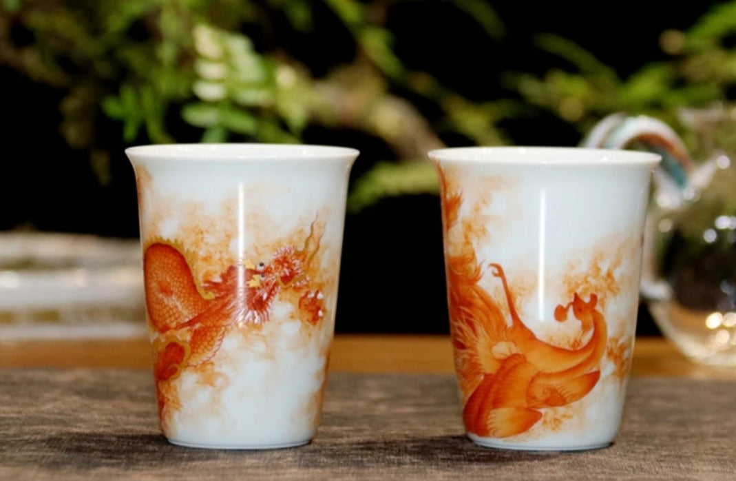 this is a Chinese Jingdezhen alum red dragon phoenix teacup.this is a ceramic teacup