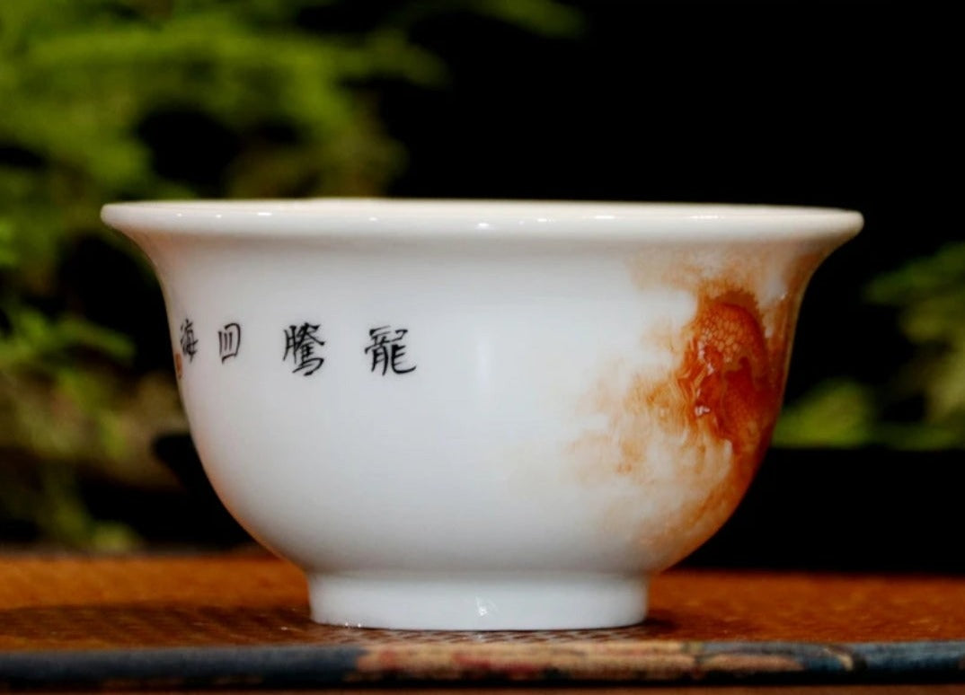 this is a Chinese Jingdezhen alum red dragon phoenix teacup.this is a ceramic teacup