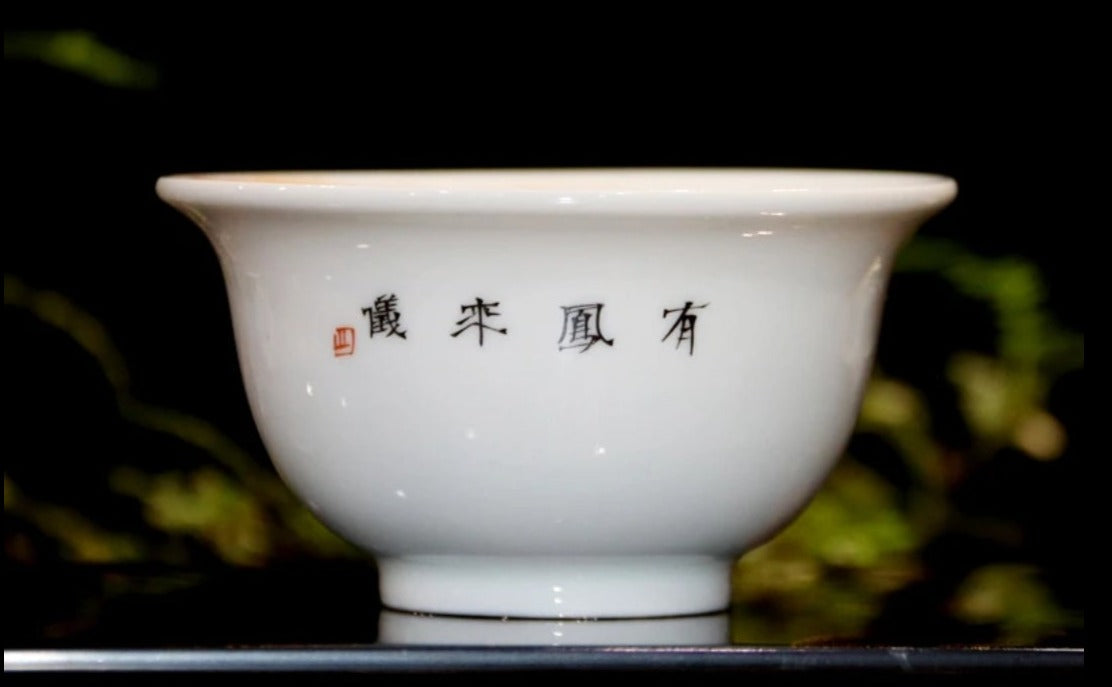 this is a Chinese Jingdezhen alum red dragon phoenix teacup.this is a ceramic teacup