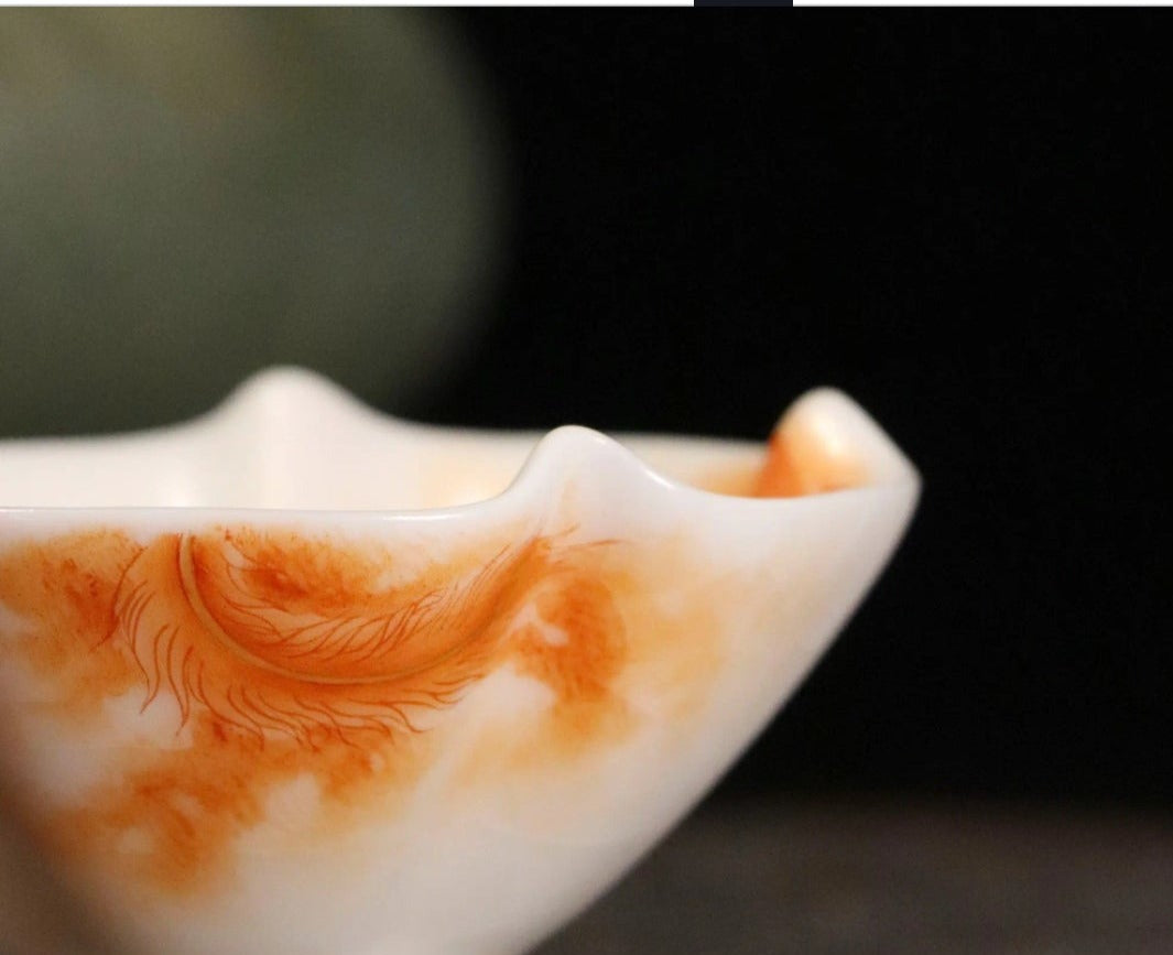 this is a Chinese Jingdezhen alum red phoenix teacup.this is a ceramic teacup