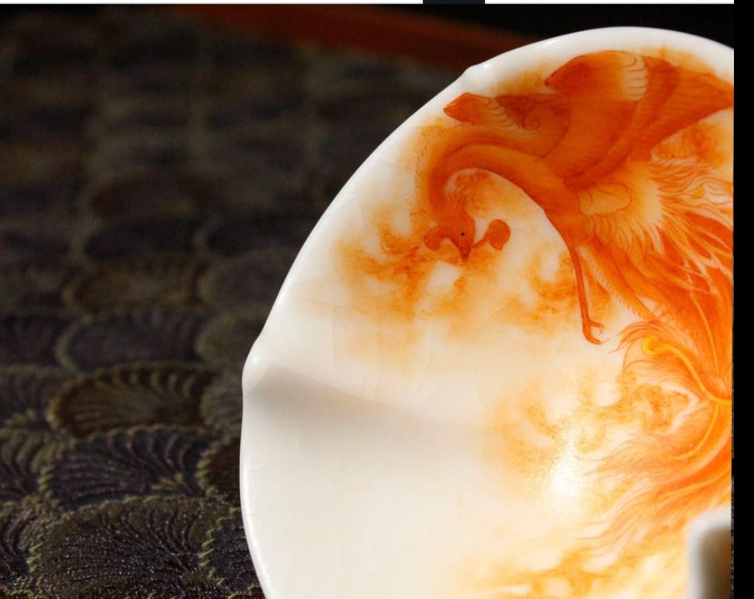 this is a Chinese Jingdezhen alum red phoenix teacup.this is a ceramic teacup