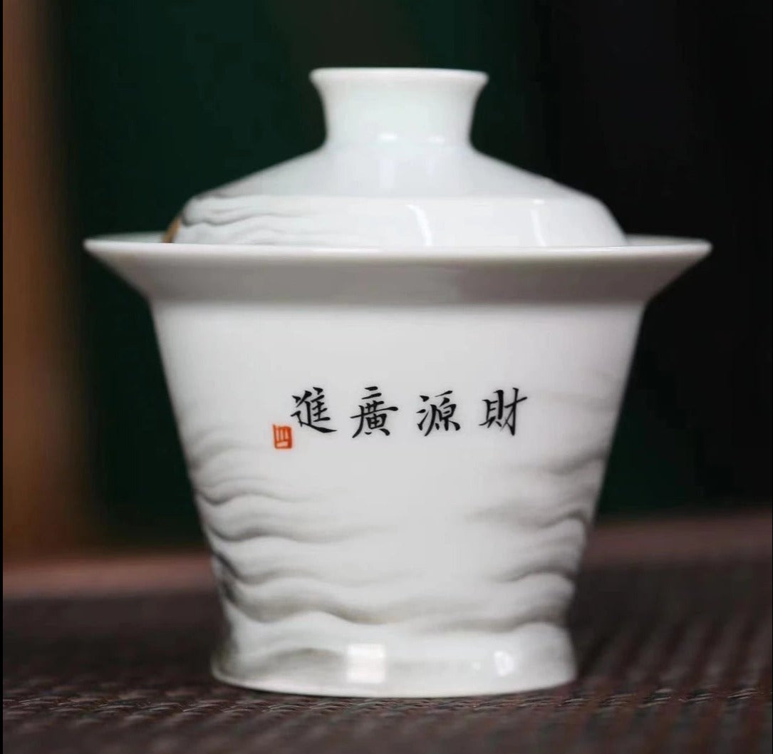 this is a Chinese Jingdezhen ceramic dragon teapot gaiwan