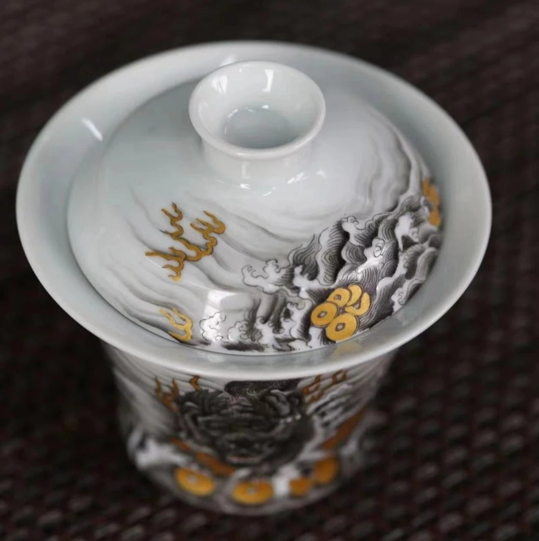 this is a Chinese Jingdezhen ceramic dragon teapot gaiwan