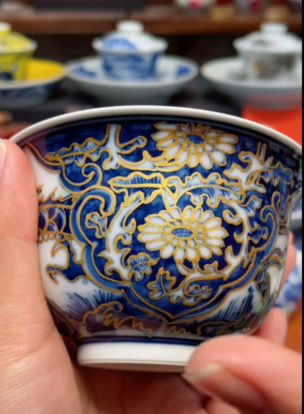 This is a Chinese Jingdezhen blue and white porcelain dragon teapot gaiwan