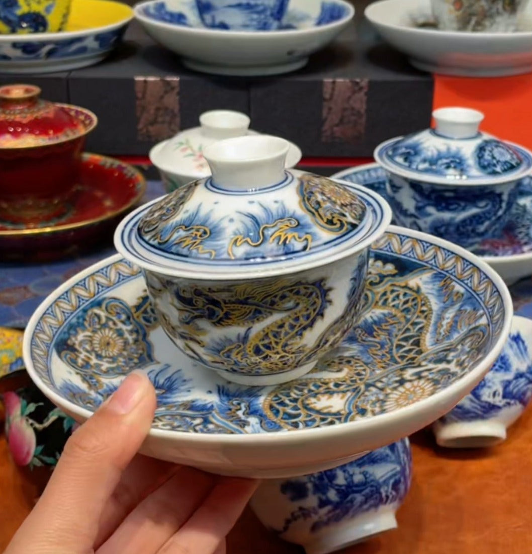 This is a Chinese Jingdezhen blue and white porcelain dragon teapot gaiwan