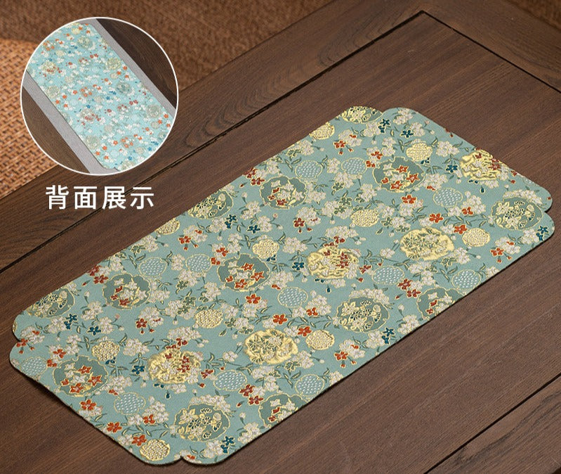 This is a silk brocade tea mat.this is a waterproof table cloth