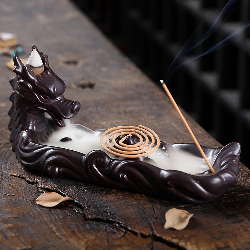 This is a pottery backflow incense holder