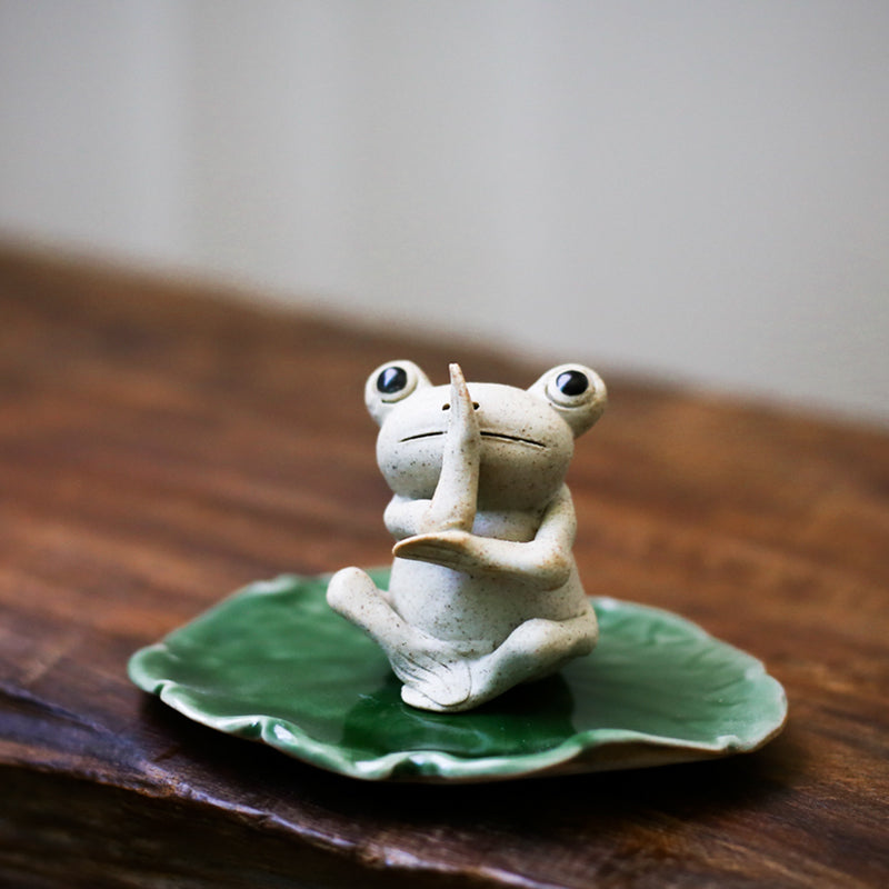 This is a pottery frog teapet