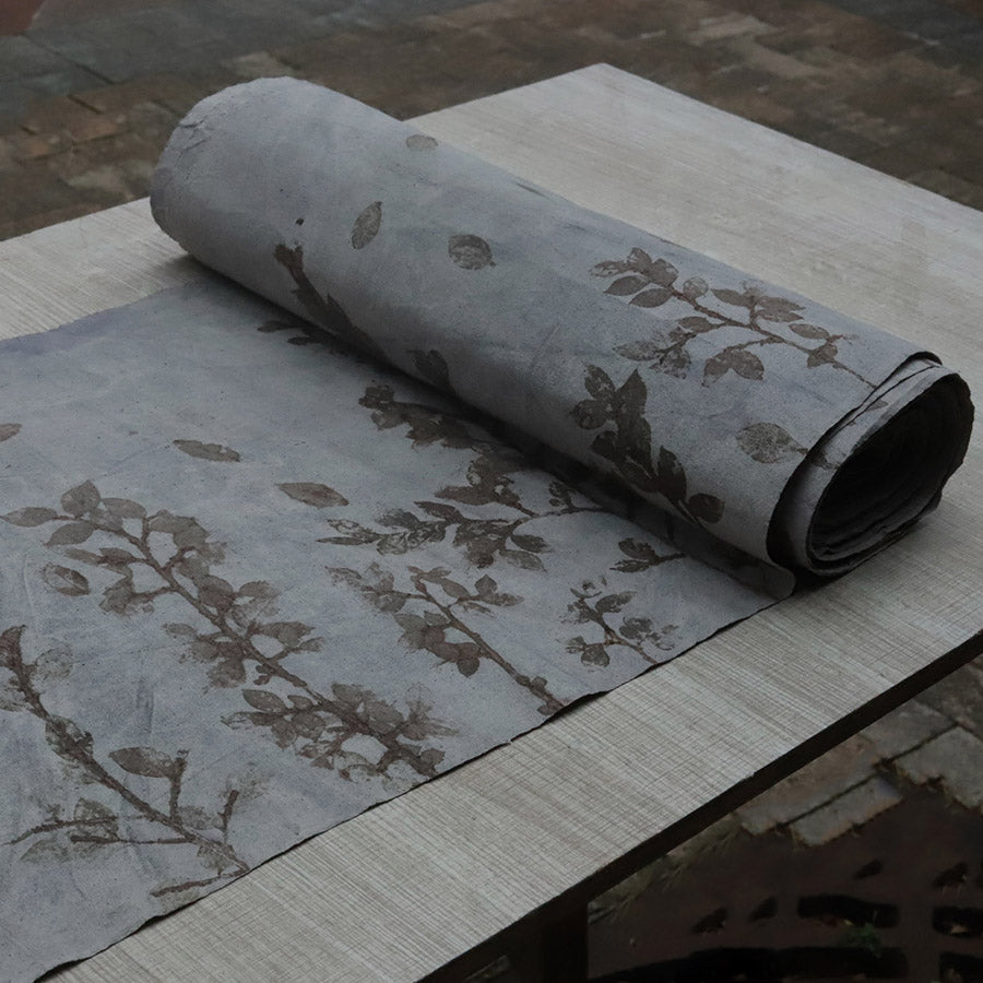 This is a plant-dyed tea mat table cloth