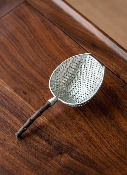 This is a tin tea scoop tea spoon