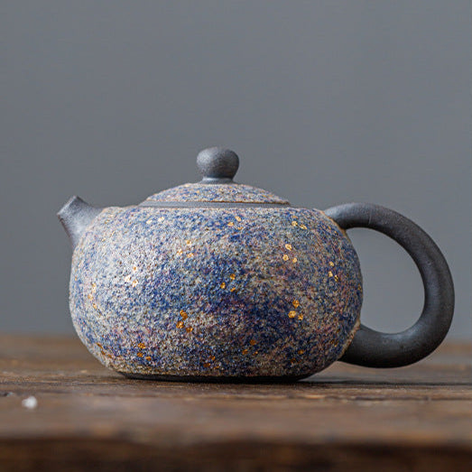 this is a pottery teapot