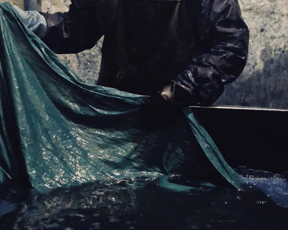 This is a indigo-dyed tea mat table cloth