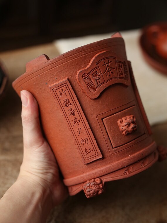 This is an electric charcoal stove. this is a chaozhou clay pottery stove 