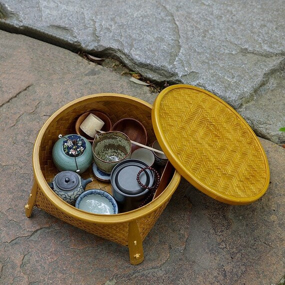 This is a bamboo weaving storage tea box.this is a yellow tea table