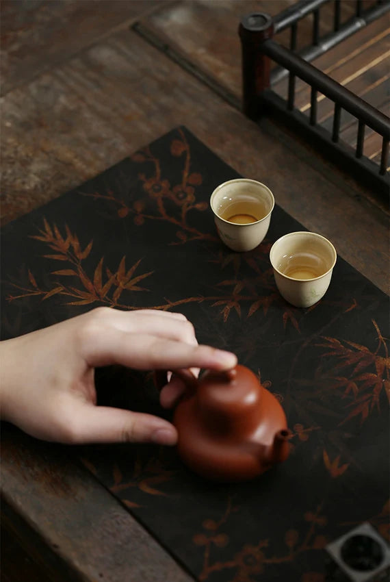 This is a gambiered canton silk xiangyunsha tea table cloth