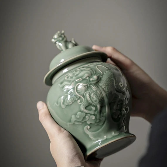 this is a celadon tea jar.this is a green ceramic tea storage canister