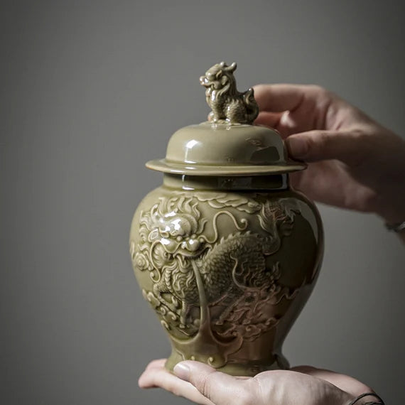 this is a celadon tea jar.this is a green ceramic tea storage canister