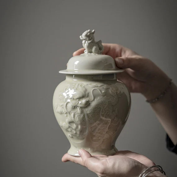 this is a celadon tea jar.this is a green ceramic tea storage canister