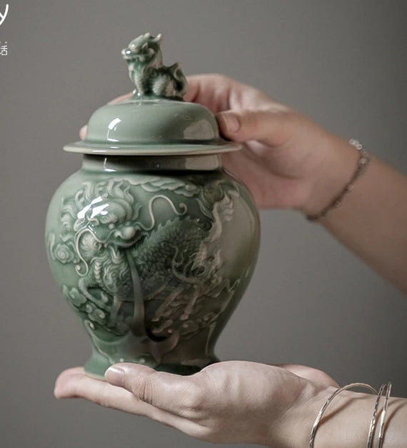 this is a celadon tea jar.this is a green ceramic tea storage canister