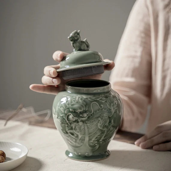 this is a celadon tea jar.this is a green ceramic tea storage canister