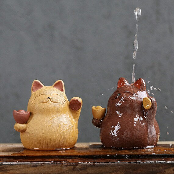 This is a Yixing purple clay Maneki-Neko teapet