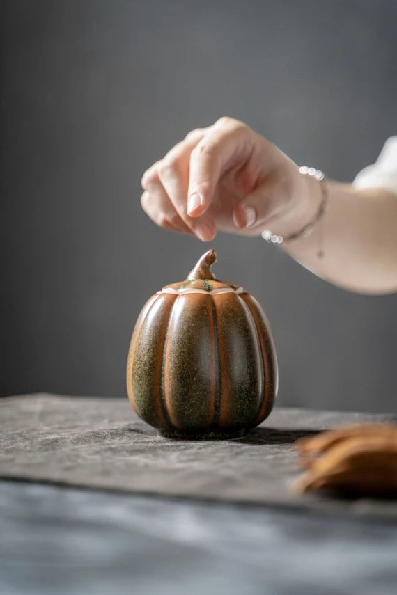 this is a ceramic tea storage canister tea jar