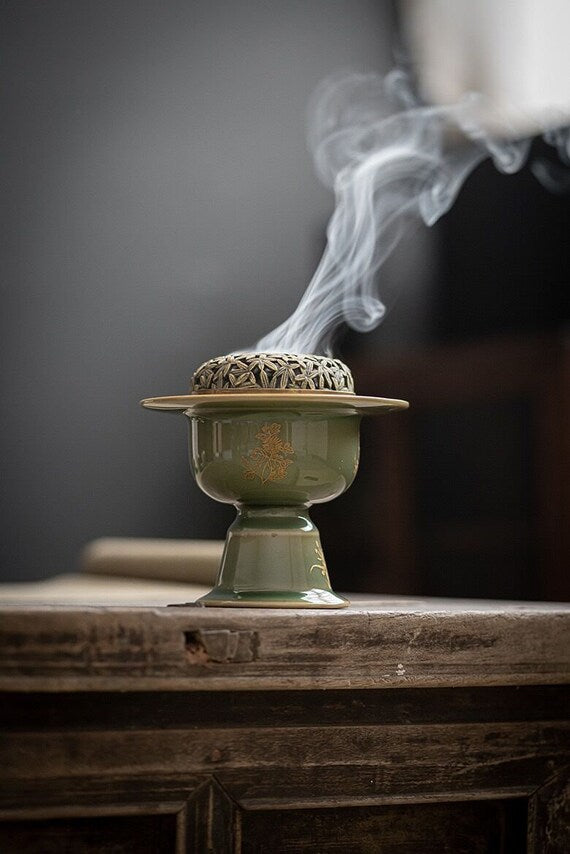 This is a Yue kiln celadon incense burner