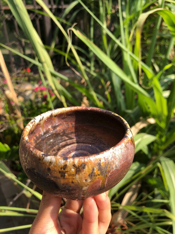 This is a woodfired pottery teacup