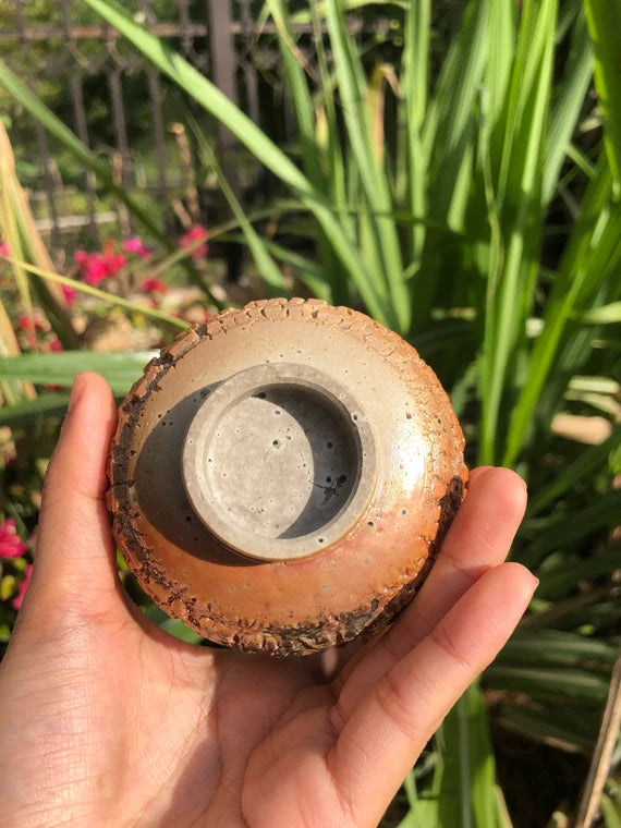 This is a woodfired pottery teacup