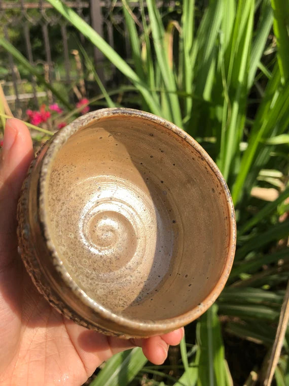 This is a woodfired pottery teacup