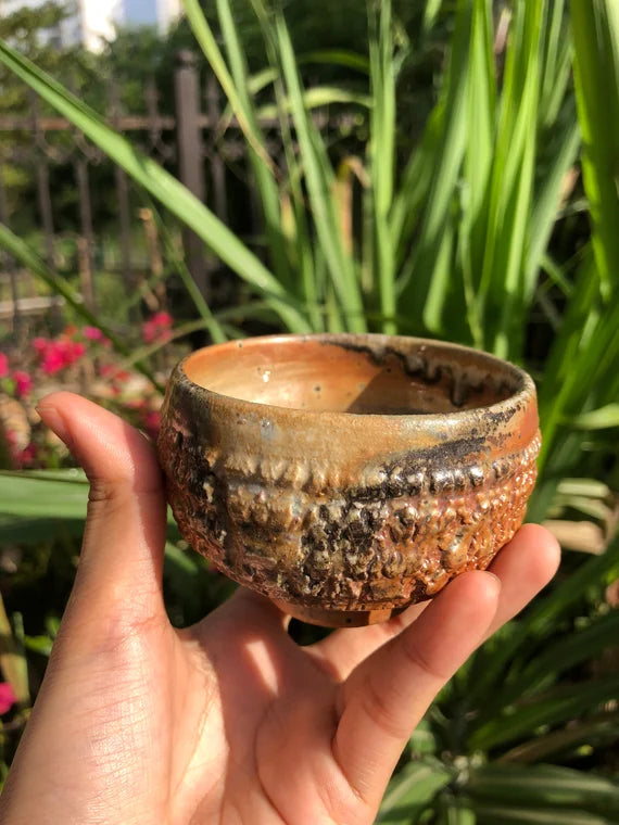 This is a woodfired pottery teacup