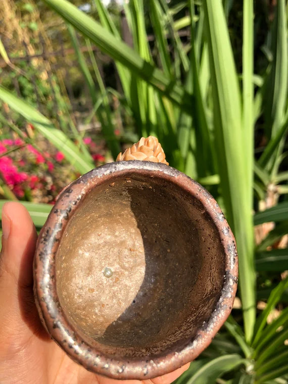 This is a woodfired pottery teacup